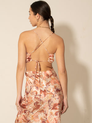 
            
                Load image into Gallery viewer, AUTILIA - BROWN FLOWER PRINT SATIN COWL NECK MAXI DRESS WITH CROSS BACK
            
        