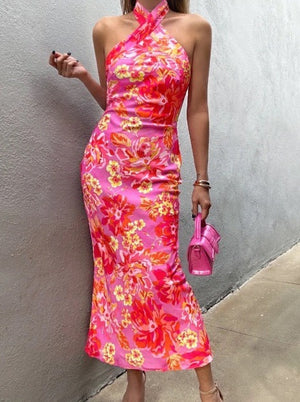 
            
                Load image into Gallery viewer, LETTY - RED AND PINK FLOWER PRINT HALTERED NECK MAXI DRESS
            
        