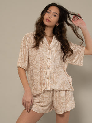
            
                Load image into Gallery viewer, AMY - BUTTON UP SHIRT BLOUSE IN BEIGE SWIRL PRINT
            
        